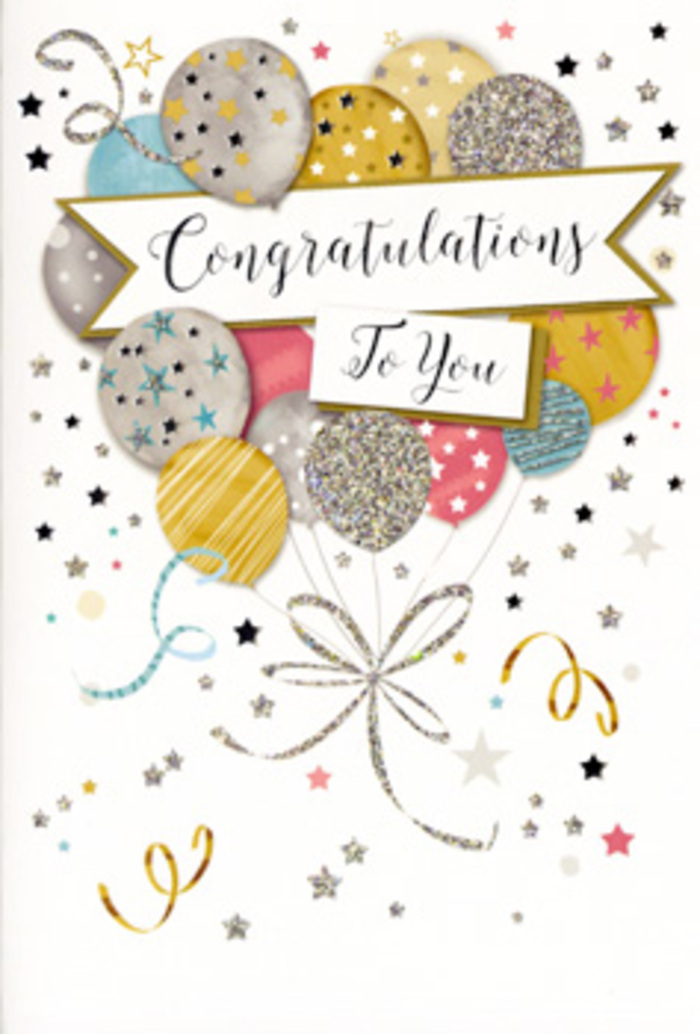 The photograph presents a refined congratulations card, styled with the same care you might expect from a hand-tied bouquet ordered here in Rotherhithe. The design showcases a lush cluster of illustrated balloons gathered like a celebratory arrangement, layered in soft shades of metallic gold, brushed silver, champagne, pale blue, and gentle blush pink, with a whisper of cool grey for contrast. Each balloon is individually decorated: some are filled with scattered stars that twinkle as if lit from within, others are wrapped in glittery bands or flecks that catch and reflect an imaginary light, reminiscent of evening reflections along the Thames Path. Their curling ribbons trail downward in elegant lines of shimmering gold and silver, intertwining gracefully and suggesting connection, achievement, and shared joy. Flowing across the centre of this floating display is a broad banner that seems to drift weightlessly, carrying the handwritten-style message "Congratulations To You" in polished, flowing script. Around the balloons and banner, the pale background is sprinkled with tiny metallic stars, dots, and looping streamers, evoking confetti tossed at a surprise celebration near Surrey Quays or a family gathering close to Rotherhithe Street. The overall mood is both playful and sophisticated, striking a balance between light-hearted festivity and heartfelt sincerity. As someone used to pairing greeting cards with fresh floral deliveries from Florist Rotherhithe, I can imagine this design resting beside a vase of seasonal blooms, the card's subtle glitter and smooth finish catching the light in a cosy local home. The atmosphere it conveys is one of quiet pride, warm recognition, and a gentle sparkle that suits graduations, promotions, or any cherished success.
